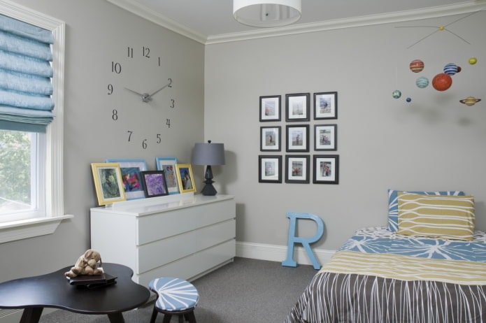 photos on the wall in the interior of the nursery