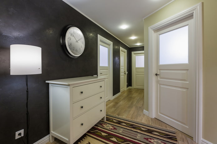 black wall in the interior of the hallway