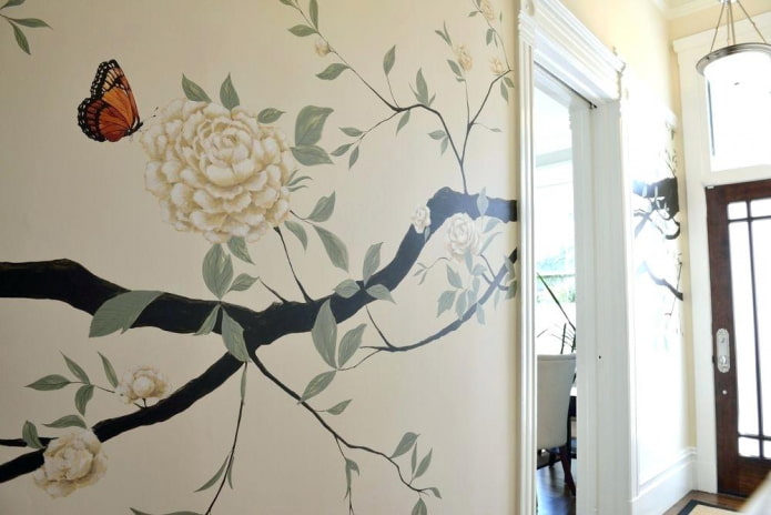 paintings of flowers on the walls in the hallway
