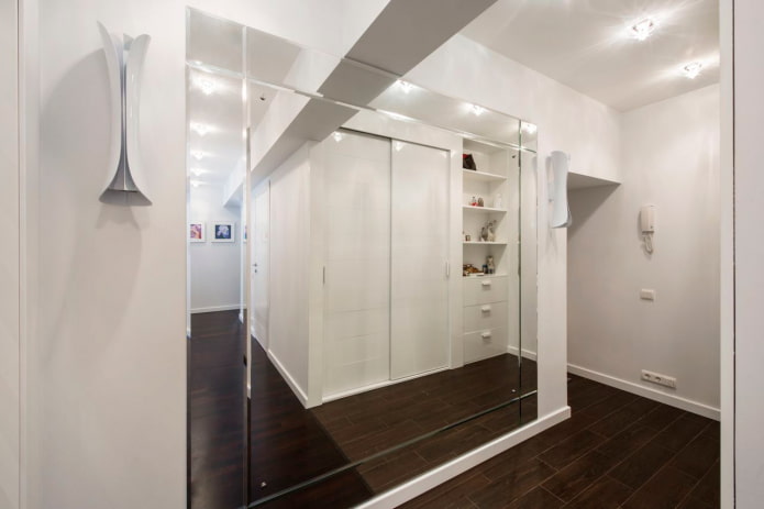 large mirror in the interior of the hallway