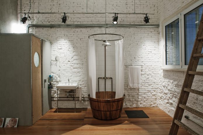 plumbing in the bathroom in the loft style