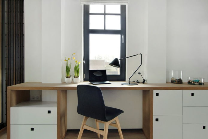 window sill turning into a computer desk in the interior