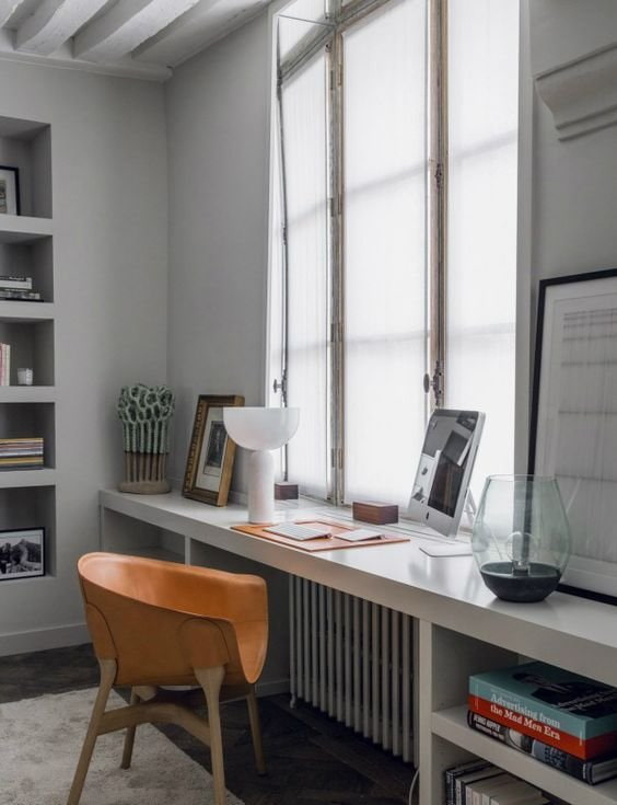 window sill turning into a table in the office
