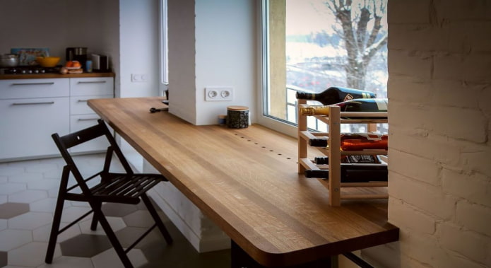 window sill turning into a wide table in the interior