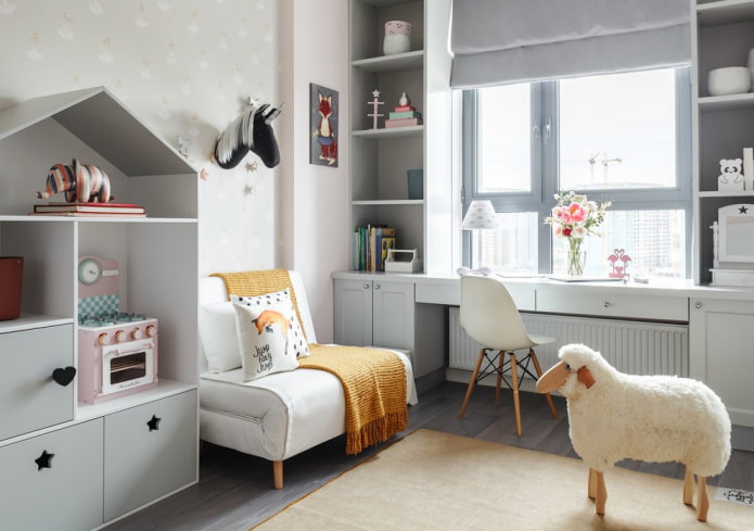 table by the window sill with drawers