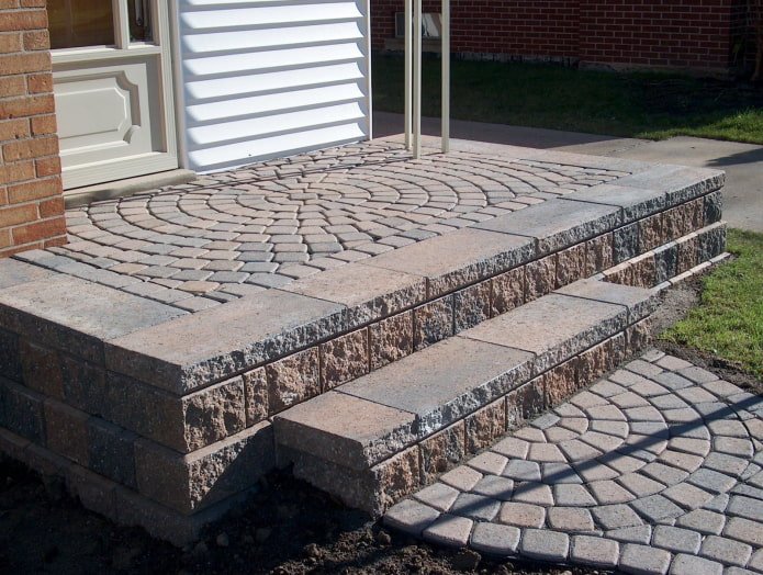 porch and approach road made of the same paving slabs
