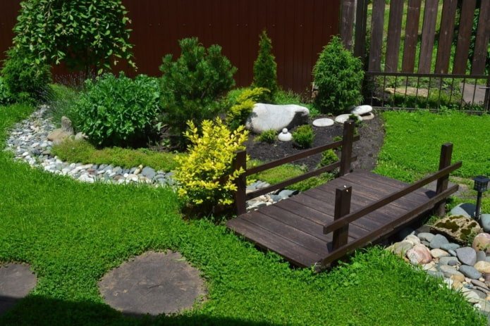 wooden bridge over a stream