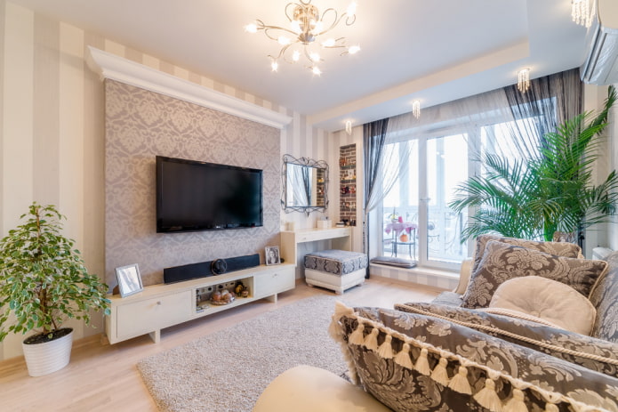 TV on the wall with wallpaper in the hall