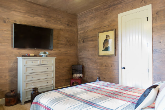 TV in the interior of a small bedroom