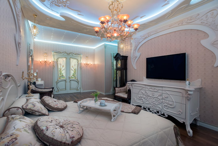 TV in the interior of the bedroom in the Art Nouveau style
