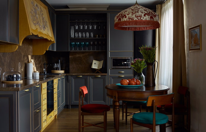 Dark kitchen with a colored hood