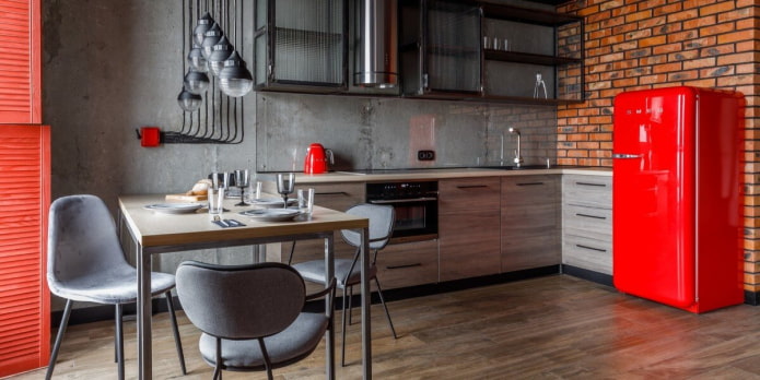 Dark kitchen with red appliances