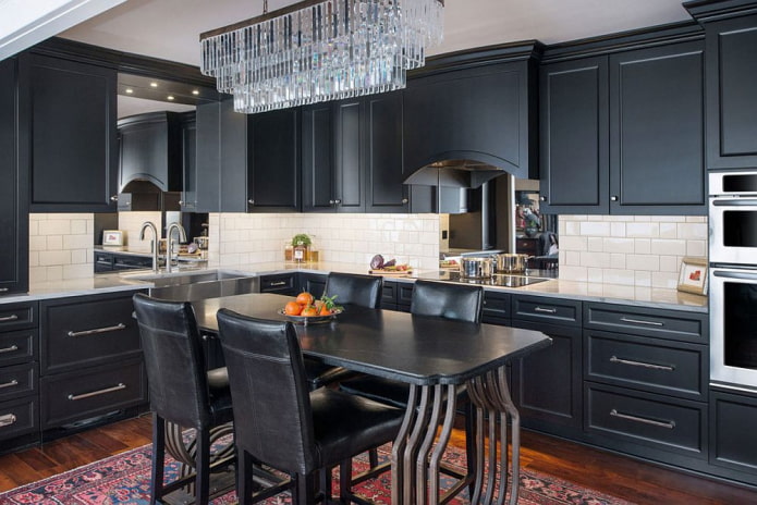 Black kitchen with a white apron