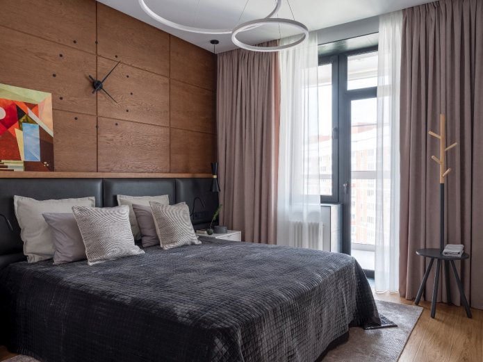 clock above the bed