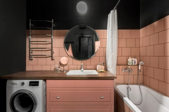 peach tiles in a dark bathroom