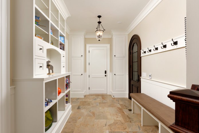 dark brown door and light furniture in the hallway