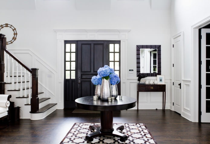 combination of black doors and dark brown flooring
