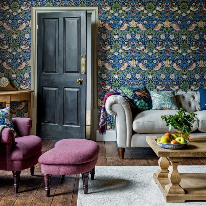 bright wallpaper and a dark door