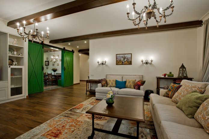 combination of green doors and dark flooring