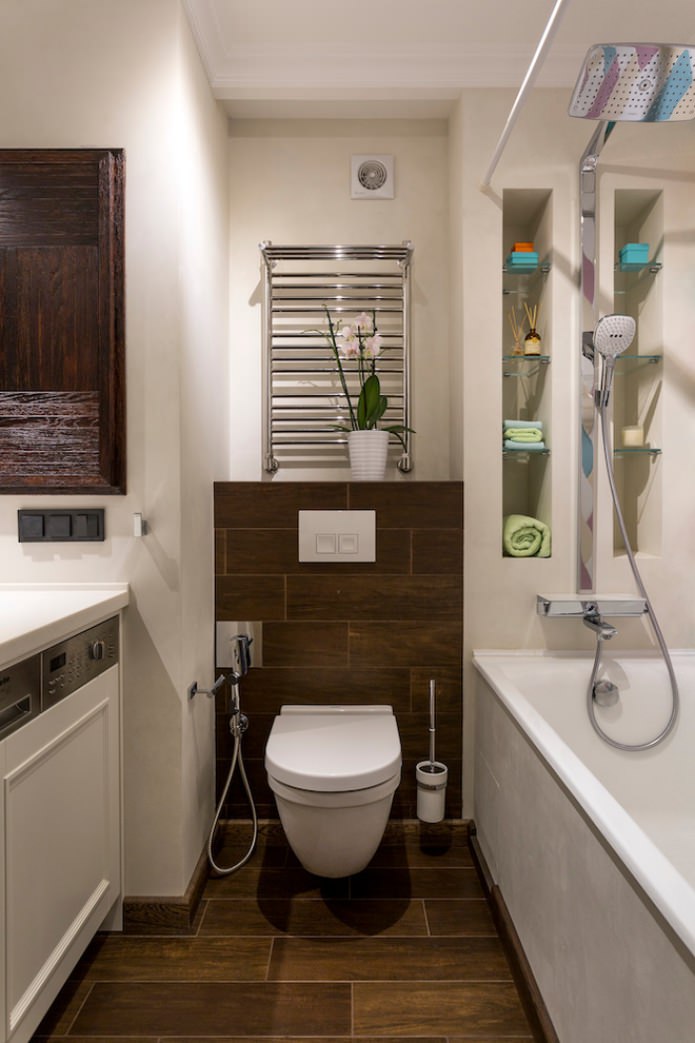 bathroom with brown tiles
