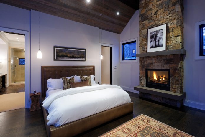leather bed and dark floor