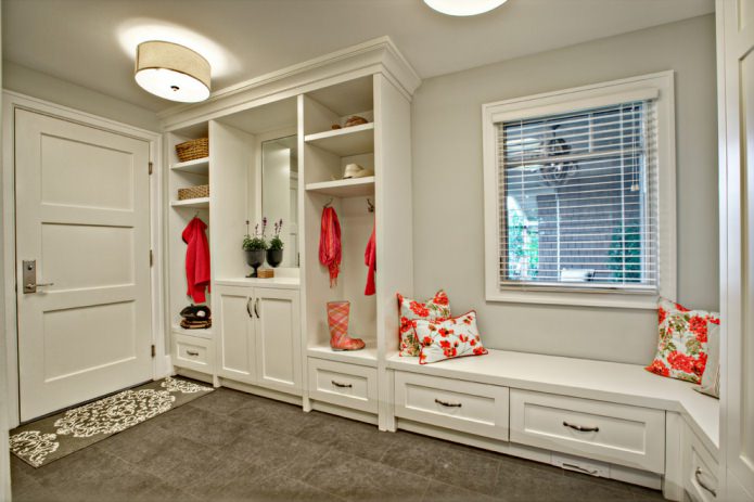 Light gray doors and a dark floor in the hallway