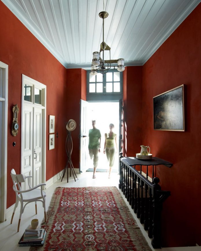 hallway with orange walls
