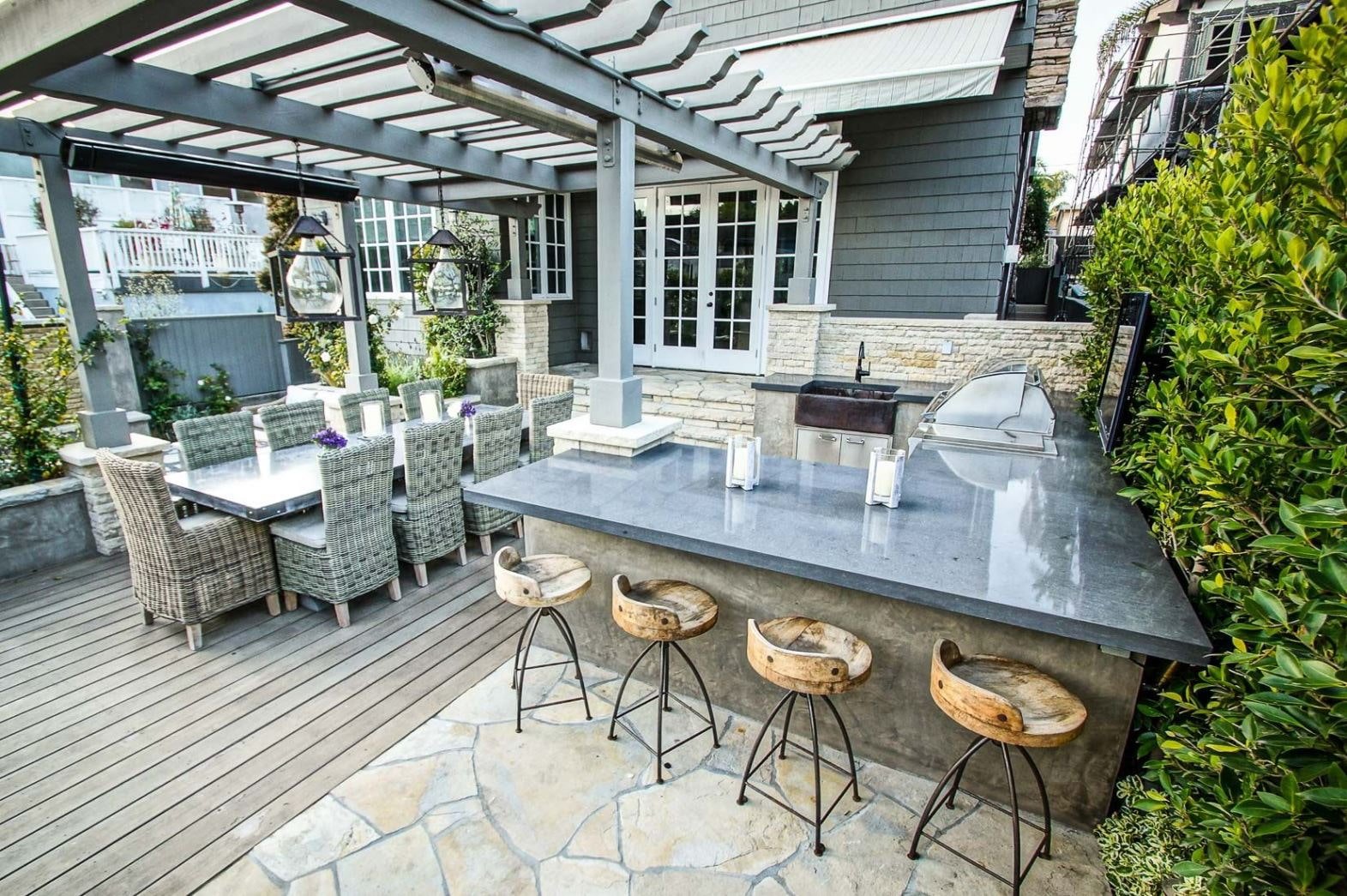 stylish armchairs and bar stools on the terrace