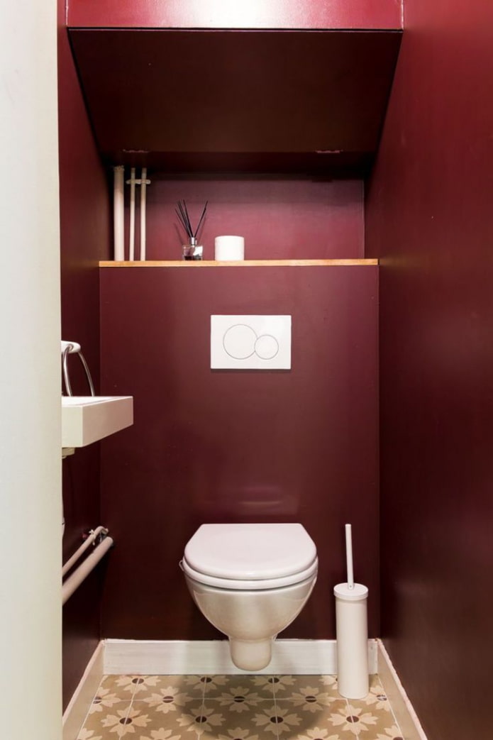 toilet in burgundy color