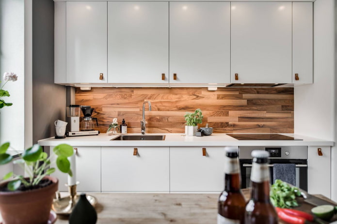 wooden apron in a white kitchen
