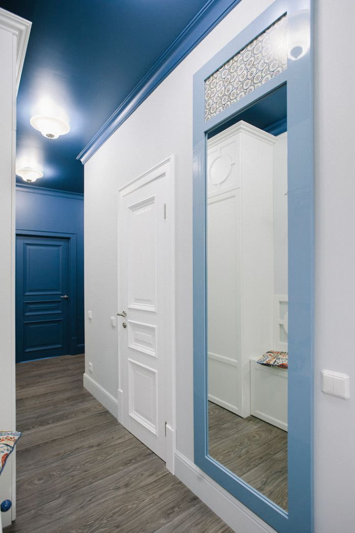 Hallway with a blue ceiling