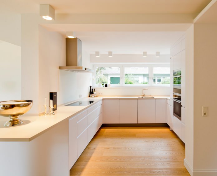 white kitchen interior with vanilla countertop