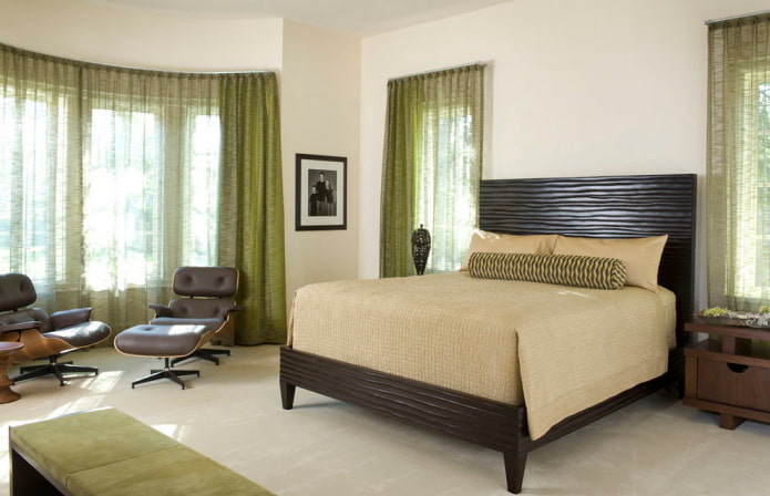 green curtains in the bedroom interior