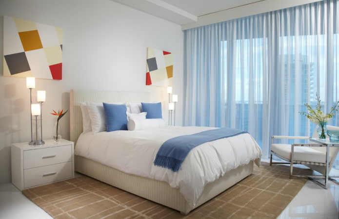 blue curtains in the bedroom interior