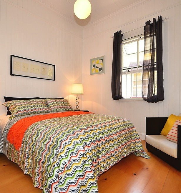 short curtains in the bedroom interior