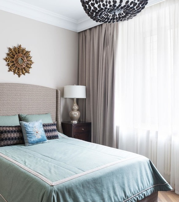 curtains with drapes in the bedroom interior