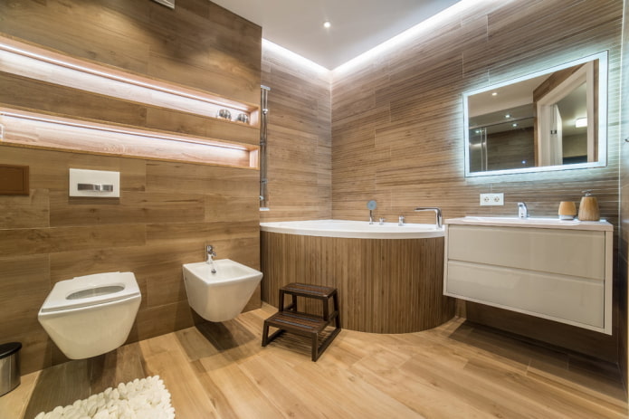 interior of a spacious bathroom with a corner acrylic bowl