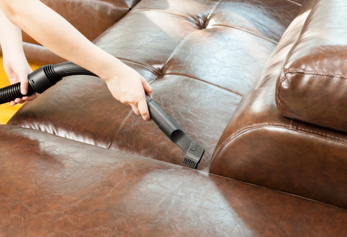 Upholstery cleaning with a vacuum cleaner