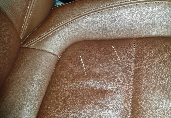 Scratches on leather