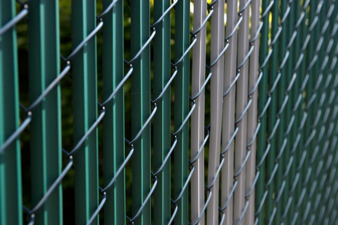 plastic slats in a chain-link fence