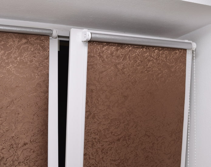 roller blinds on a plastic window