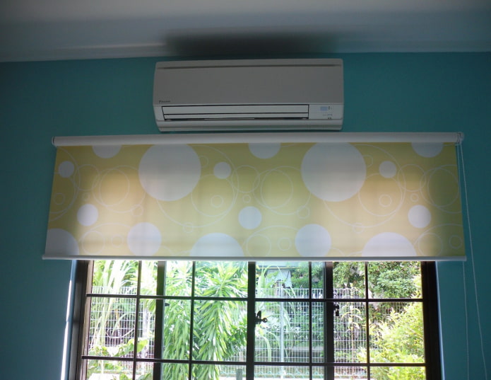 colored roller blind on the wall