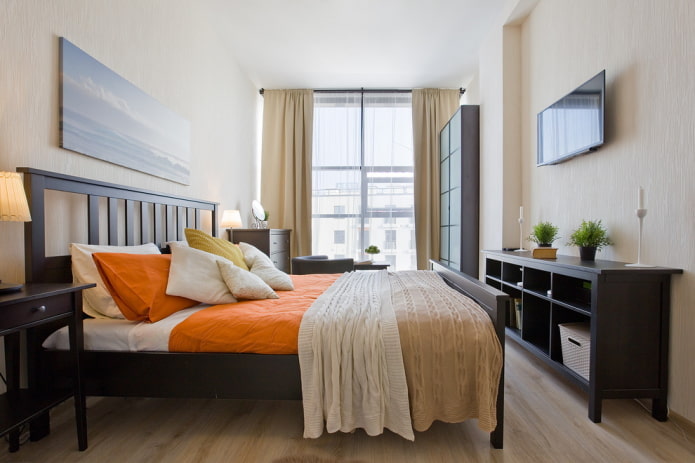 wallpaper in the interior of a narrow bedroom