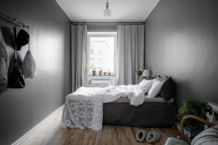 curtains in the interior of a narrow bedroom