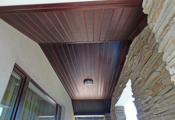 Dark paneling on the ceiling