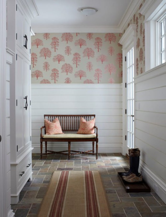a combination of paneling and wallpaper
