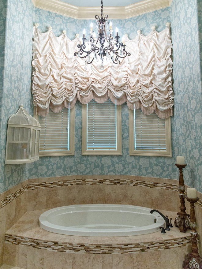 Bathtub in a bay window on a podium