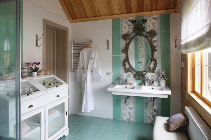 Bathroom in white and emerald colors