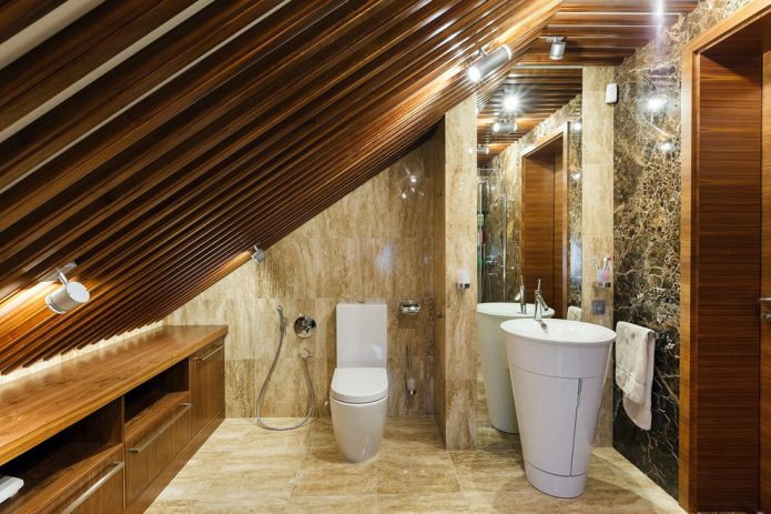 wooden slats on the ceiling in an attic bathroom