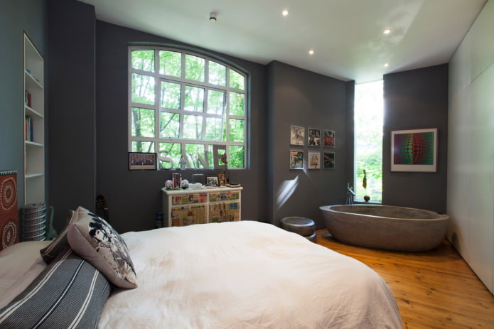 Bathtub in a gray bedroom